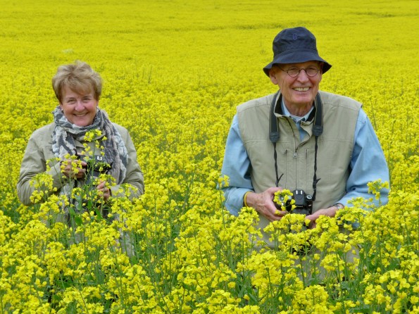 Marj & Lowell smiling in Rapeseed